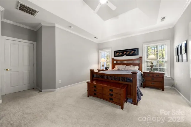 a room with a bed and a window