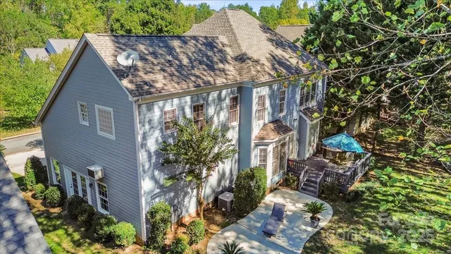 a backyard of a house with lots of green space