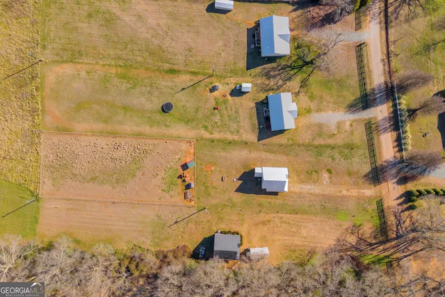a view of a house with yard and ocean view