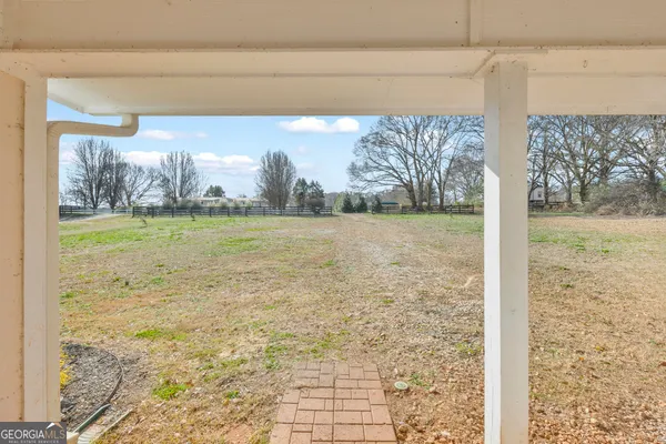 a view of a large window with an outdoor space