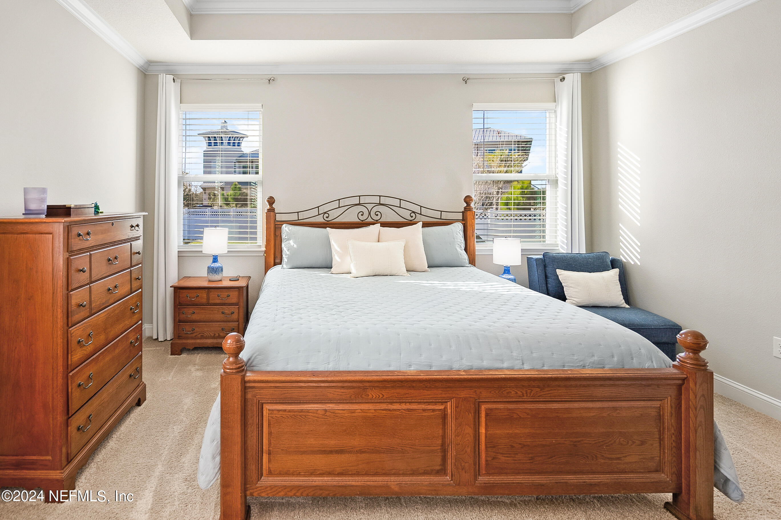 62 Thistleton Way Street St. Augustine, FL 32092 - Photo 14 of 29 a bedroom with a bed and a window