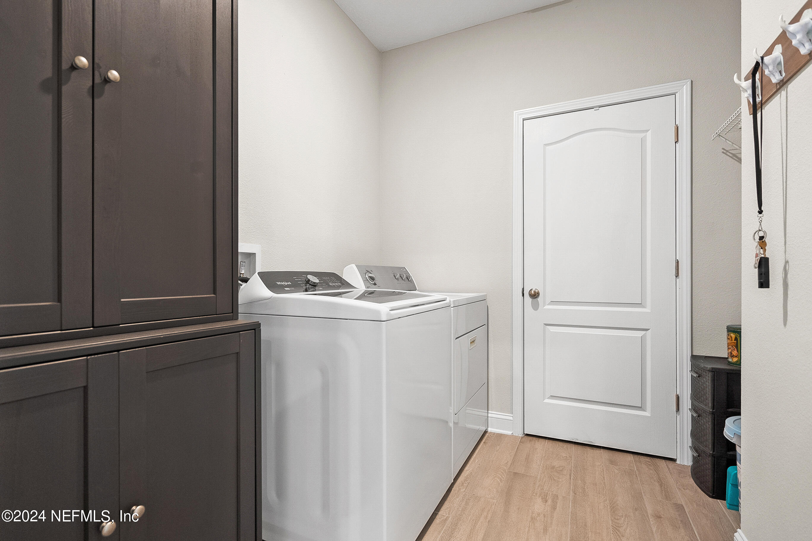 62 Thistleton Way Street St. Augustine, FL 32092 - Photo 20 of 29 a utility room with closet dryer and washer