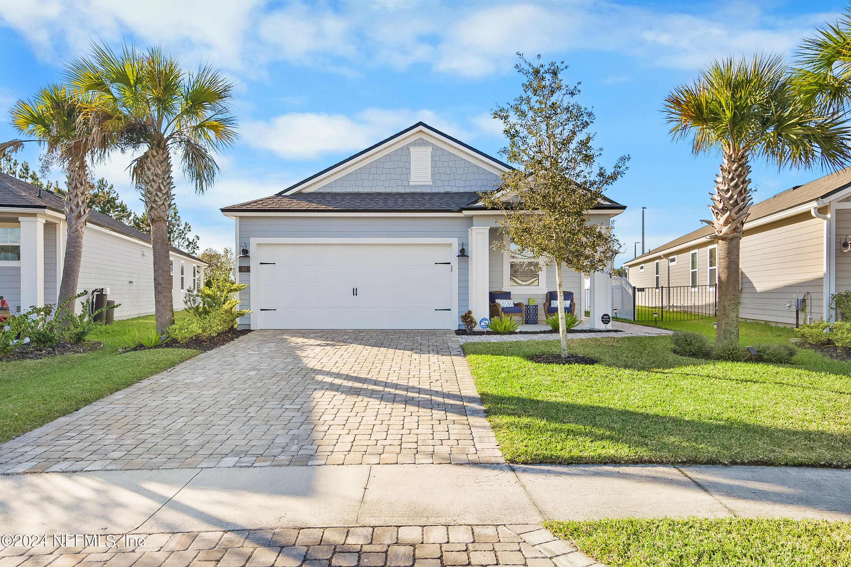 62 Thistleton Way Street St. Augustine, FL 32092 - Photo 29 of 29 a front view of a house with garden