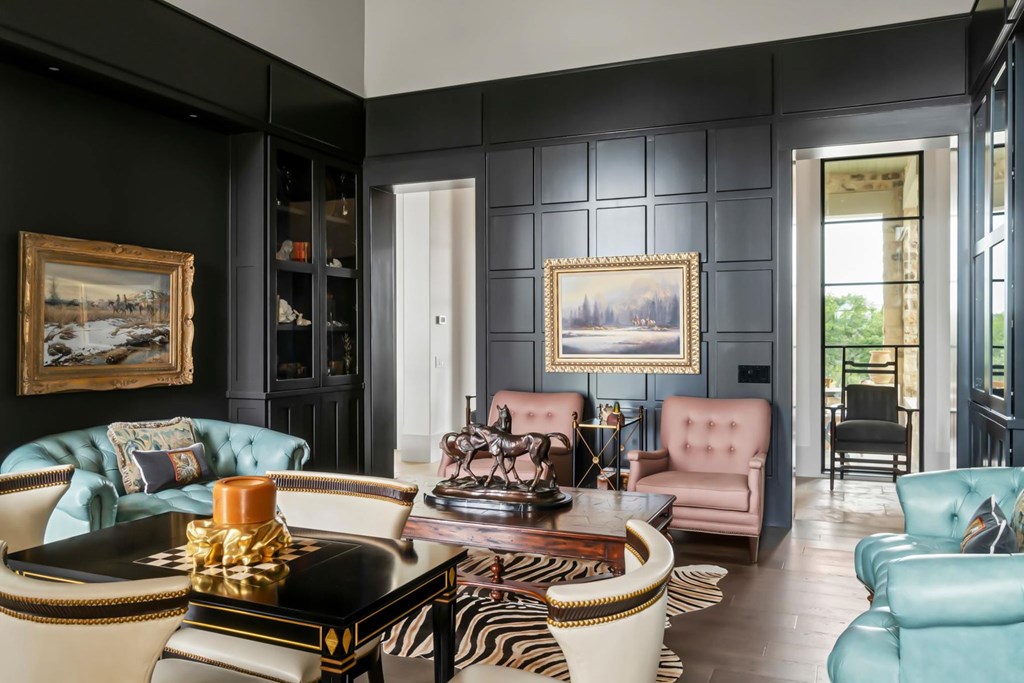 371 Achtzehn Road Fredericksburg, TX 78624 - Photo 13 of 41 a living room with furniture and a large window