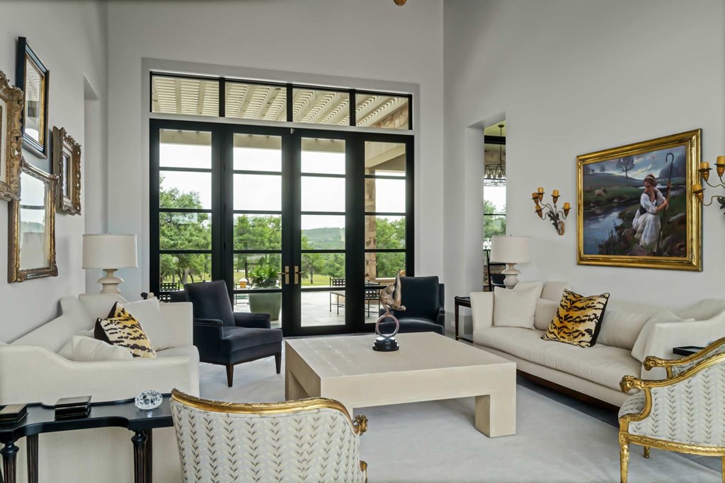 371 Achtzehn Road Fredericksburg, TX 78624 - Photo 23 of 41 a living room with furniture and a large window
