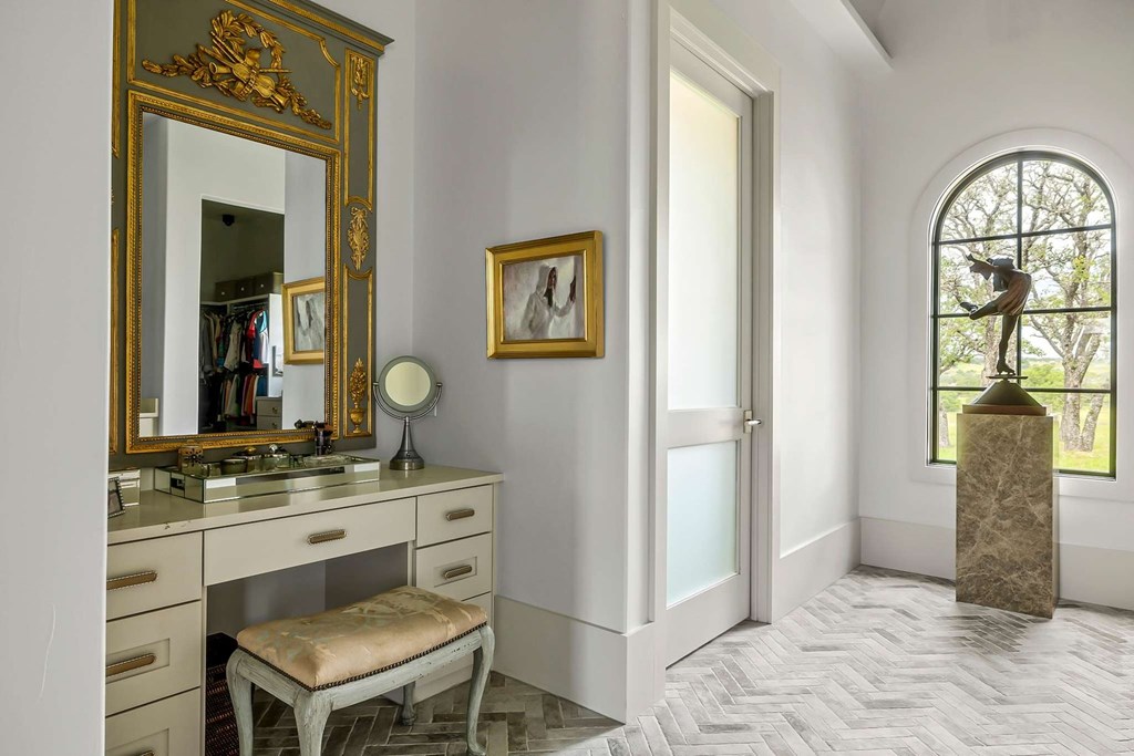 371 Achtzehn Road Fredericksburg, TX 78624 - Photo 31 of 41 a view of bathroom with a sink and a mirror