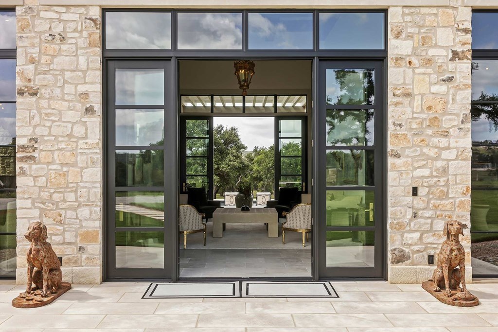 371 Achtzehn Road Fredericksburg, TX 78624 - Photo 7 of 41 a living room with a fireplace