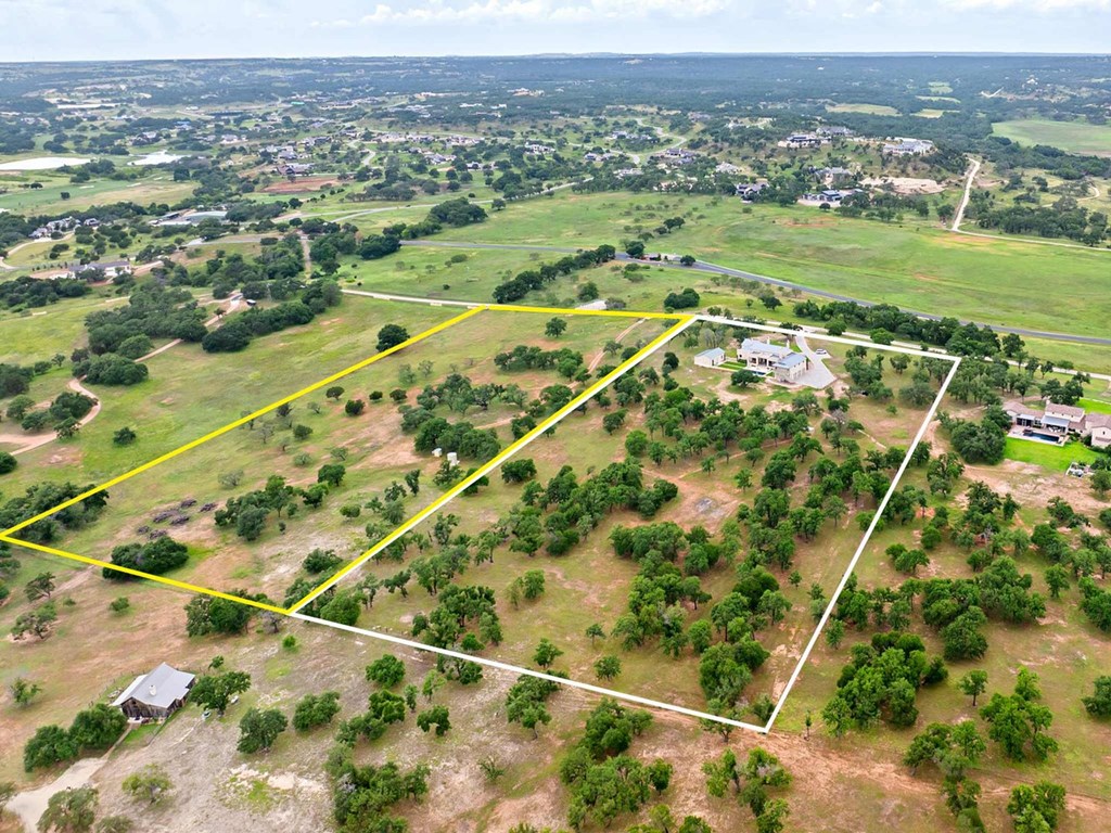 371 Achtzehn Road Fredericksburg, TX 78624 - Photo 8 of 41 an aerial view of residential houses with outdoor space and trees
