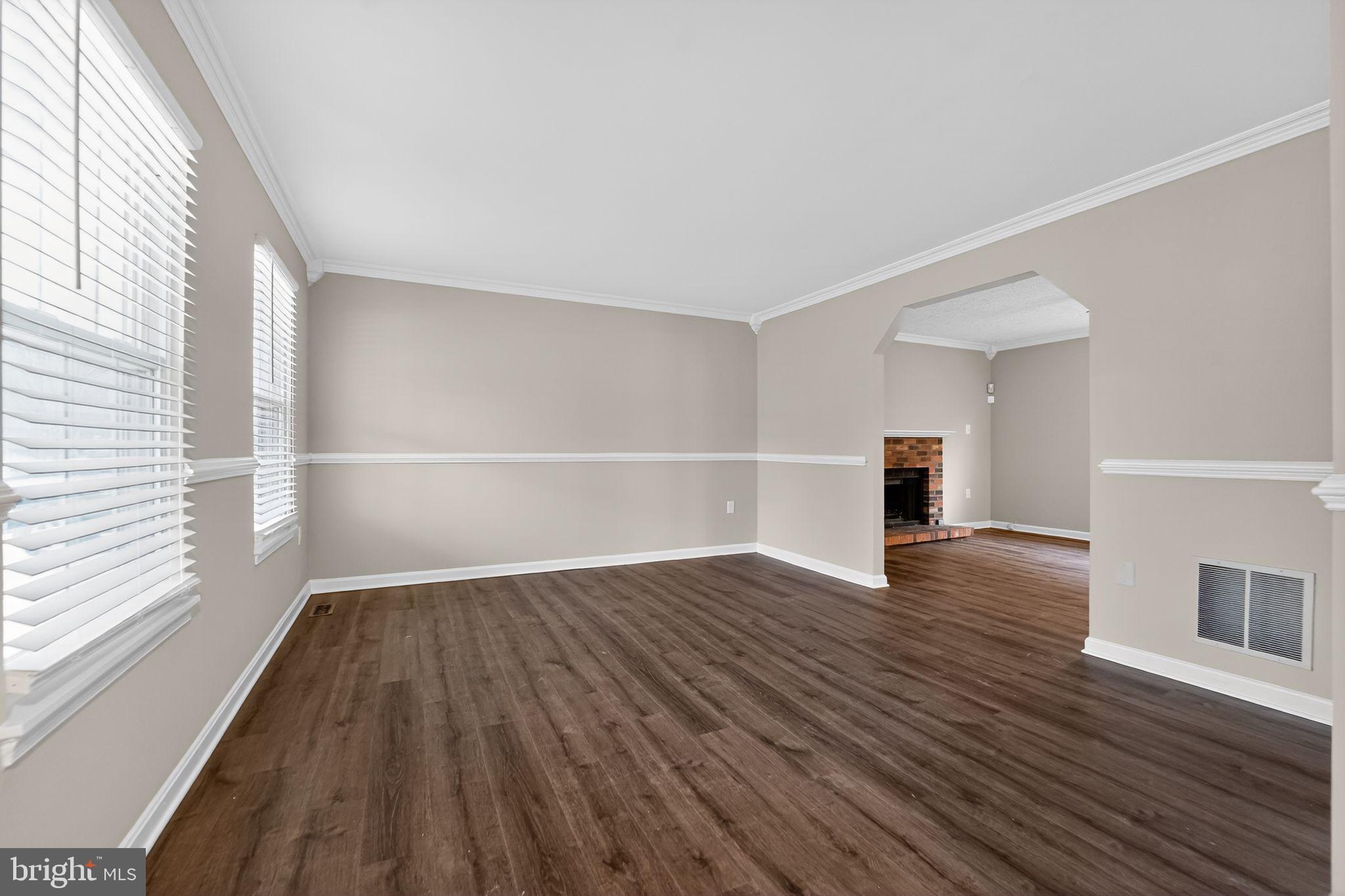 5904 Mardella Boulevard Clinton, MD 20735 - Photo 13 of 34 wooden floor in an empty room with a window