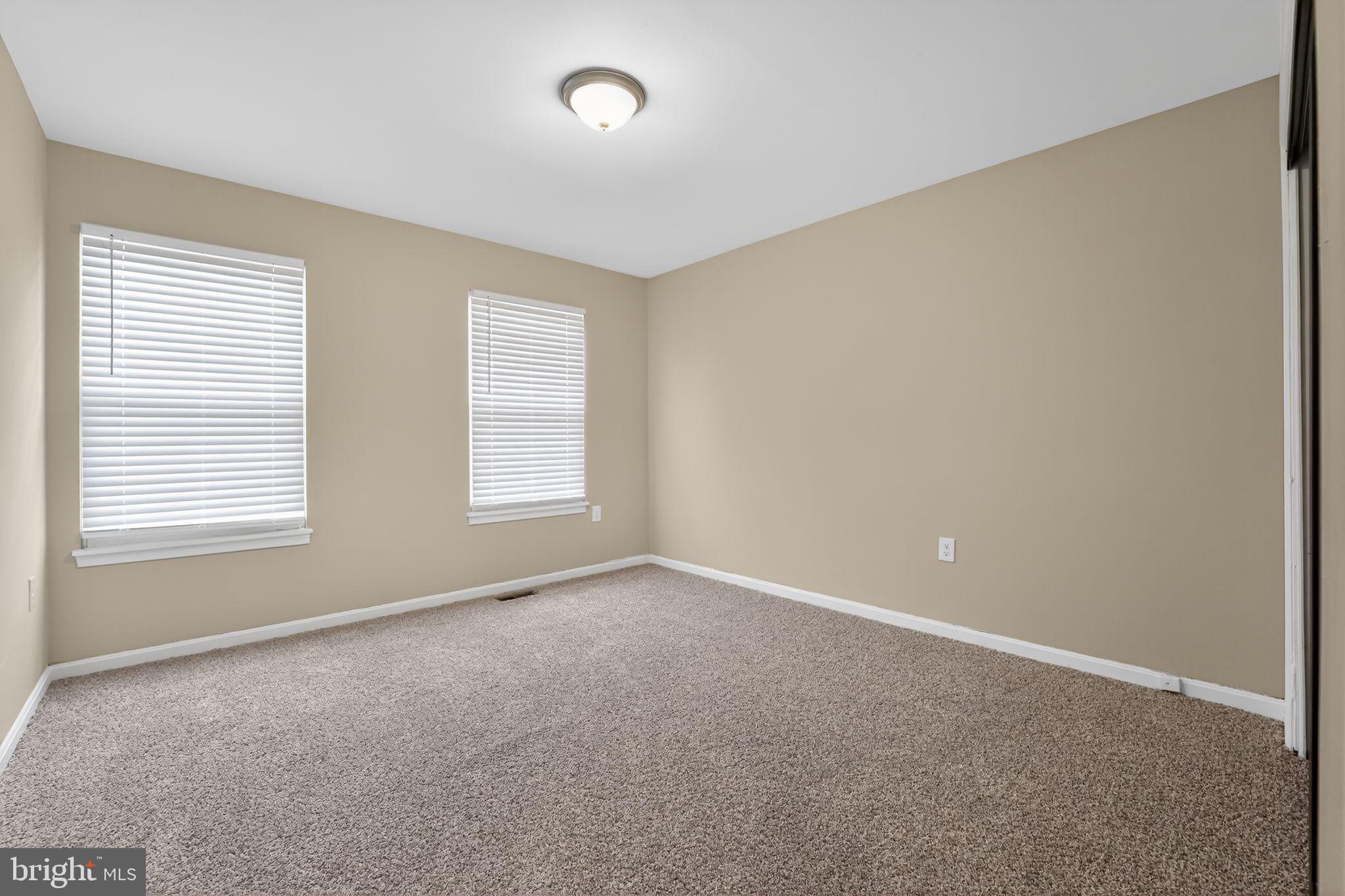 5904 Mardella Boulevard Clinton, MD 20735 - Photo 14 of 34 an empty room with windows
