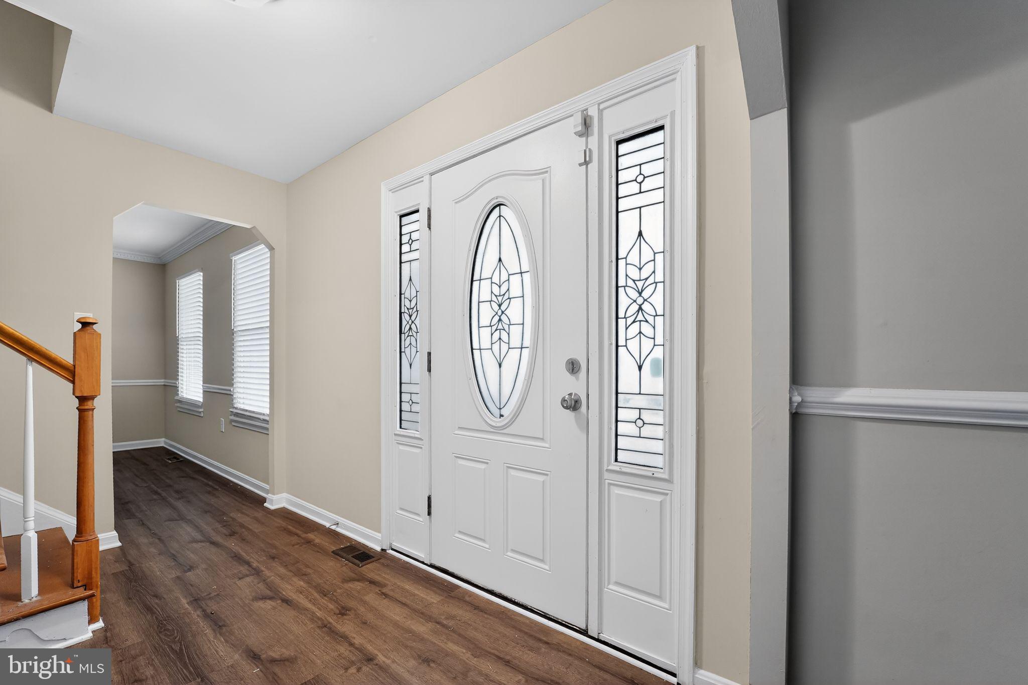 5904 Mardella Boulevard Clinton, MD 20735 - Photo 2 of 34 a view of front door with wooden floor