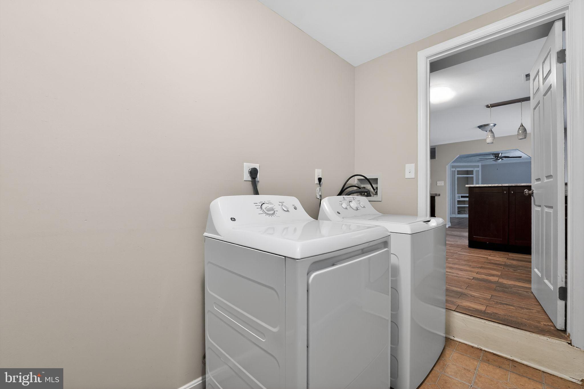 5904 Mardella Boulevard Clinton, MD 20735 - Photo 31 of 34 a utility room with dryer and washer