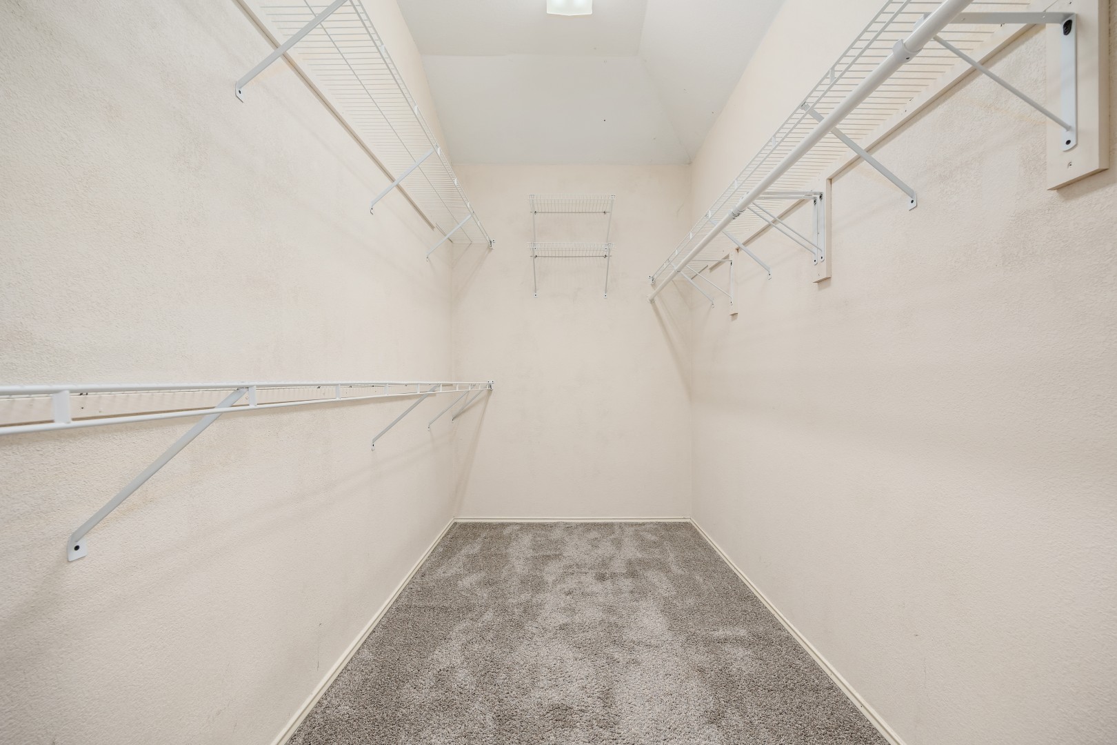 1108 Antelope Ridge Cedar Park, TX 78613 - Photo 13 of 39 Ample wire shelving and soft carpeting define this functional walk-in closet space.