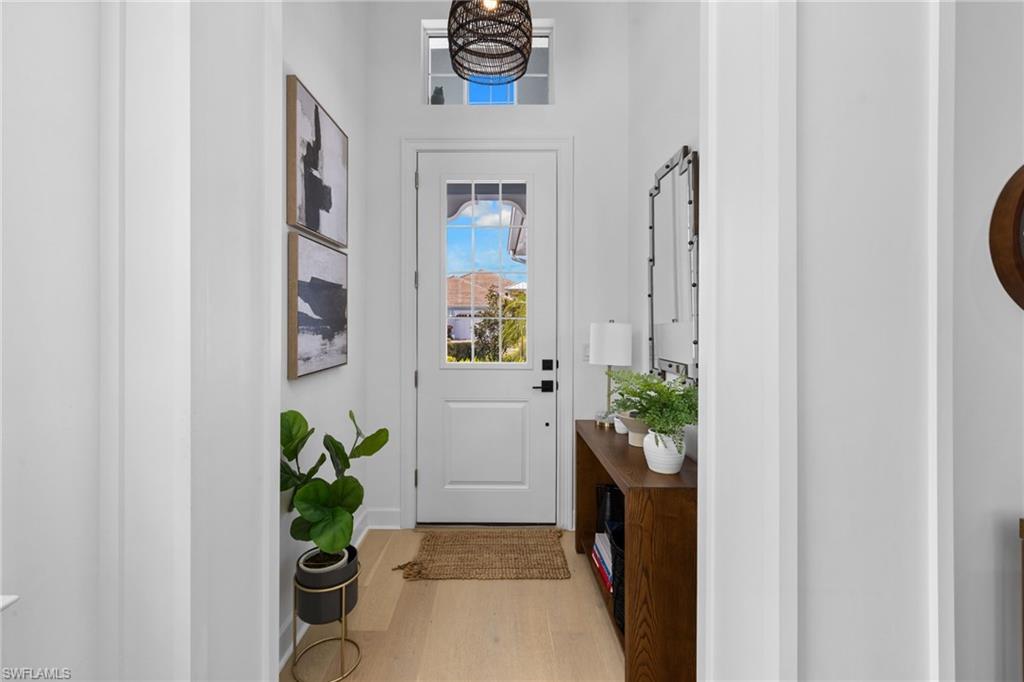 6291 Arriba Avenue Naples, FL 34113 - Photo 43 of 43 a view of a entryway door of the house
