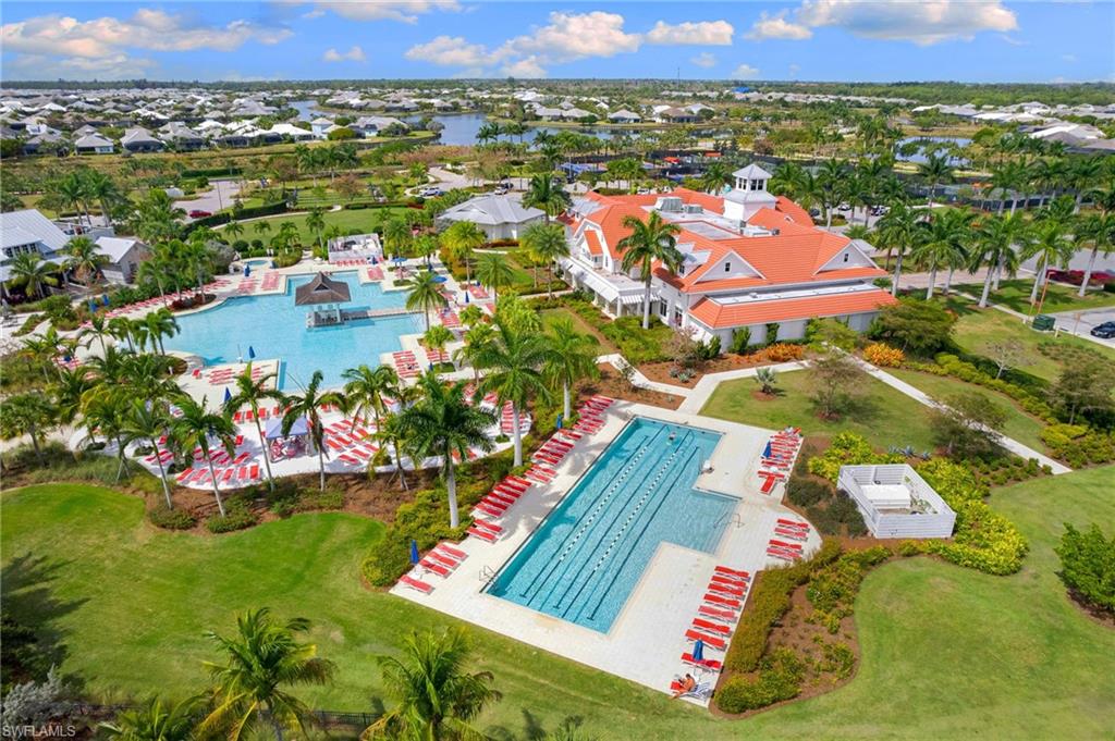 6291 Arriba Avenue Naples, FL 34113 - Photo 22 of 43 an aerial view of residential houses with outdoor space and swimming pool