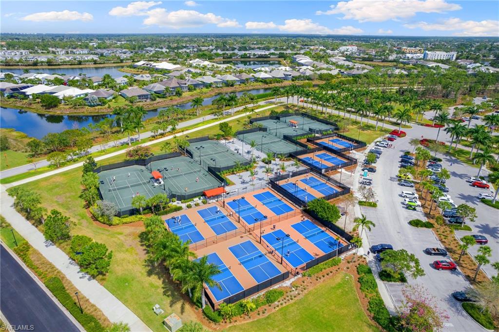 6291 Arriba Avenue Naples, FL 34113 - Photo 23 of 43 an aerial view of residential houses with outdoor space