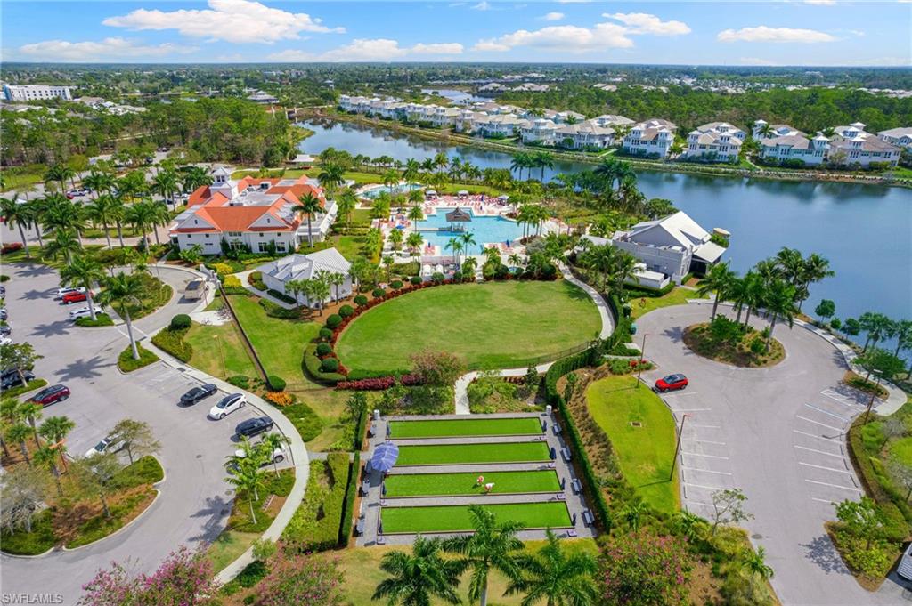 6291 Arriba Avenue Naples, FL 34113 - Photo 29 of 43 an aerial view of a swimming pool and outdoor space