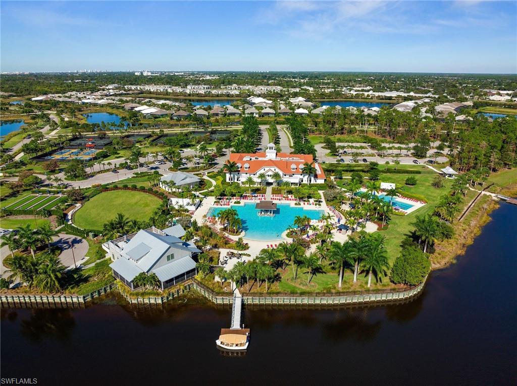 6291 Arriba Avenue Naples, FL 34113 - Photo 31 of 43 an aerial view of residential houses with outdoor space