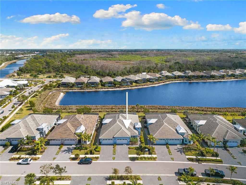 6291 Arriba Avenue Naples, FL 34113 - Photo 36 of 43 an aerial view of residential houses with outdoor space