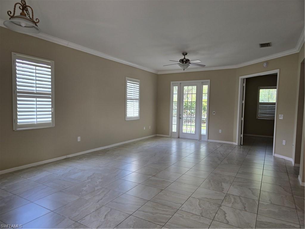 1020 Peggy Circle, Unit 101 Naples, FL 34113 - Photo 5 of 30 a view of an empty room with a window