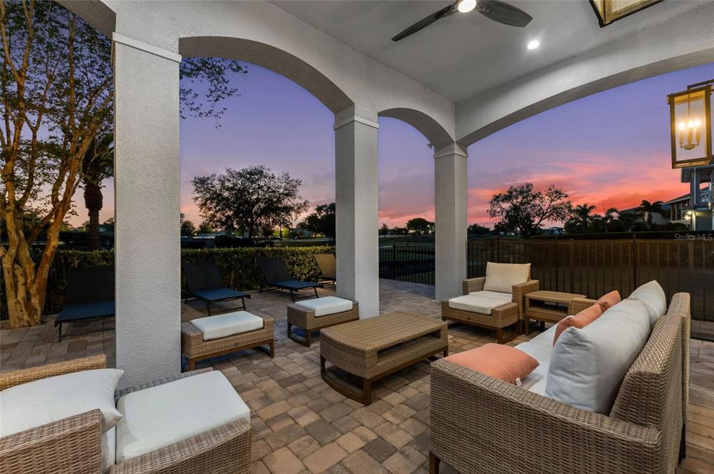 304 Muirfield Loop Reunion, FL 34747 - Photo 65 of 85 a outdoor living space with furniture and city view