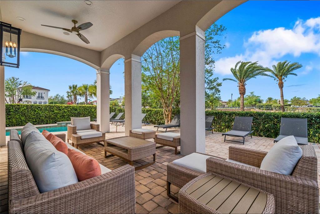 304 Muirfield Loop Reunion, FL 34747 - Photo 8 of 85 a outdoor space with patio the couches and pool