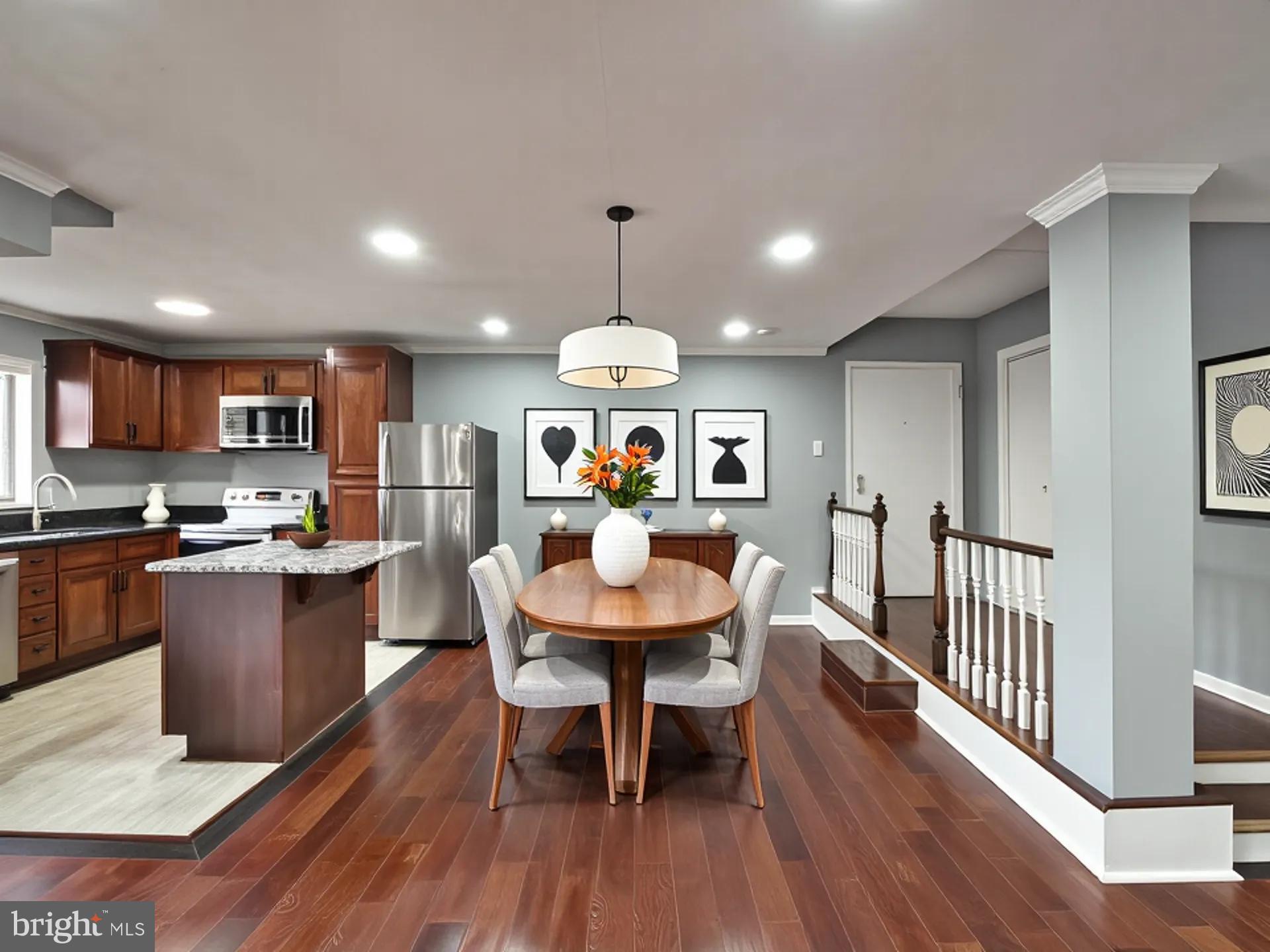 15712 Dorset Road, Unit 104 Laurel, MD 20707 - Photo 12 of 49 a view of a dining room with furniture window and wooden floor