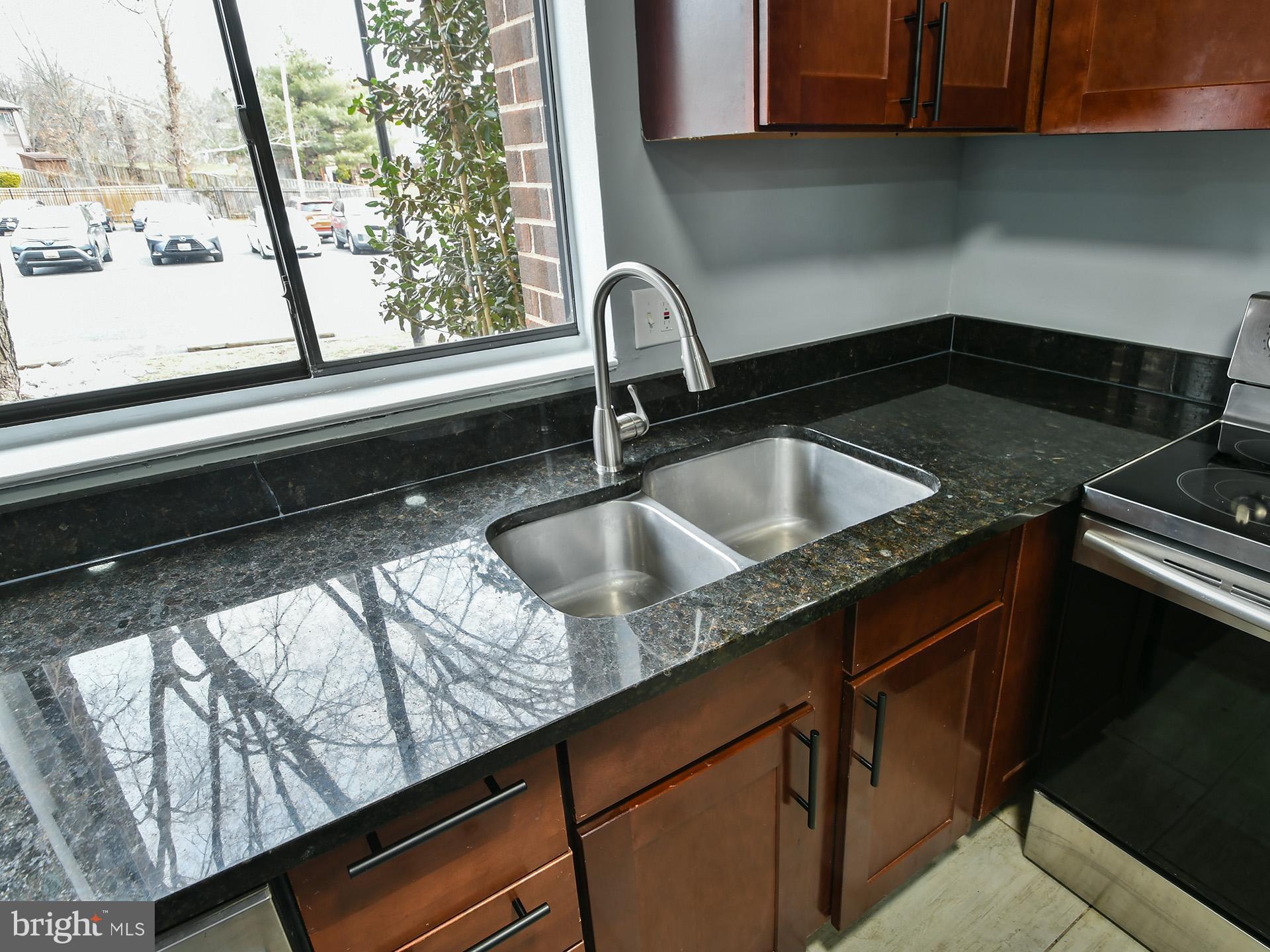 15712 Dorset Road, Unit 104 Laurel, MD 20707 - Photo 17 of 49 a close view of sink and tap