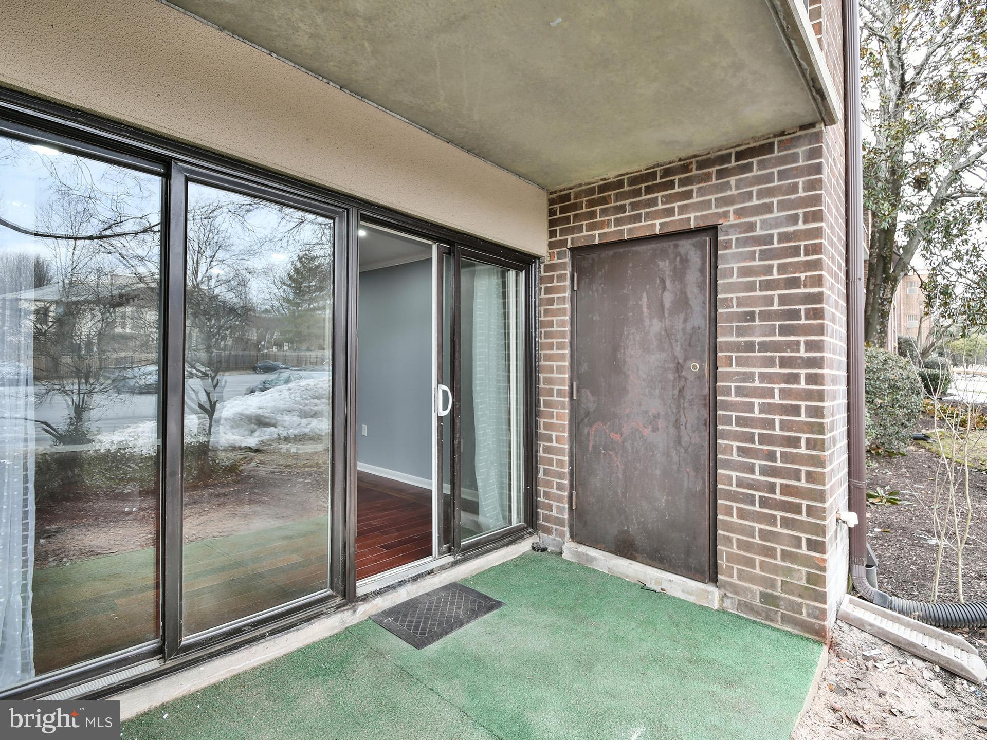 15712 Dorset Road, Unit 104 Laurel, MD 20707 - Photo 42 of 49 a view of outdoor space with sliding door