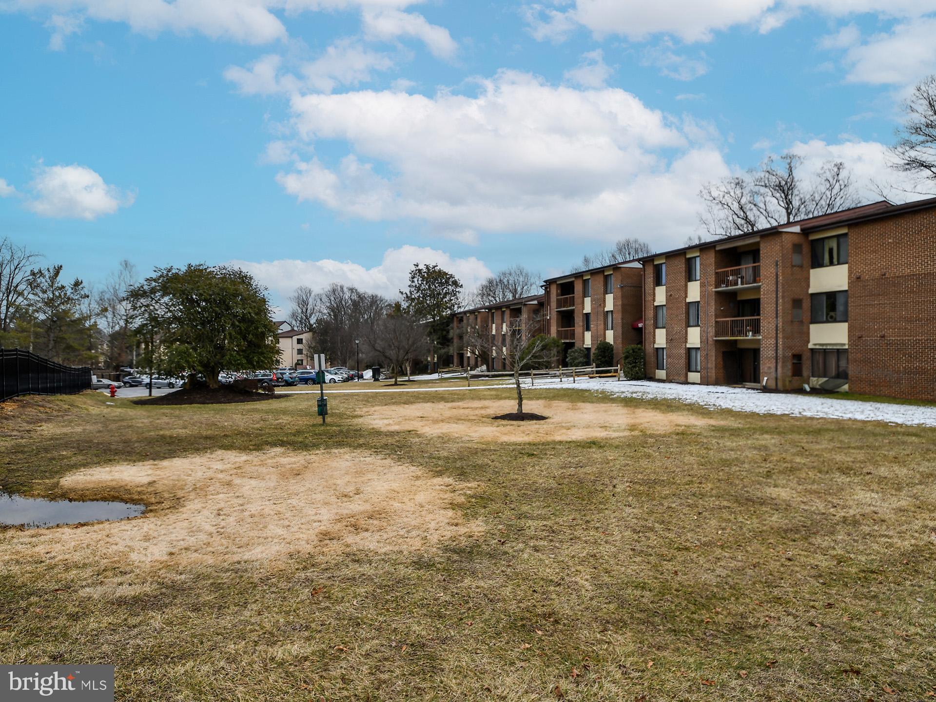 15712 Dorset Road, Unit 104 Laurel, MD 20707 - Photo 44 of 49 a view of swimming pool with outdoor seating