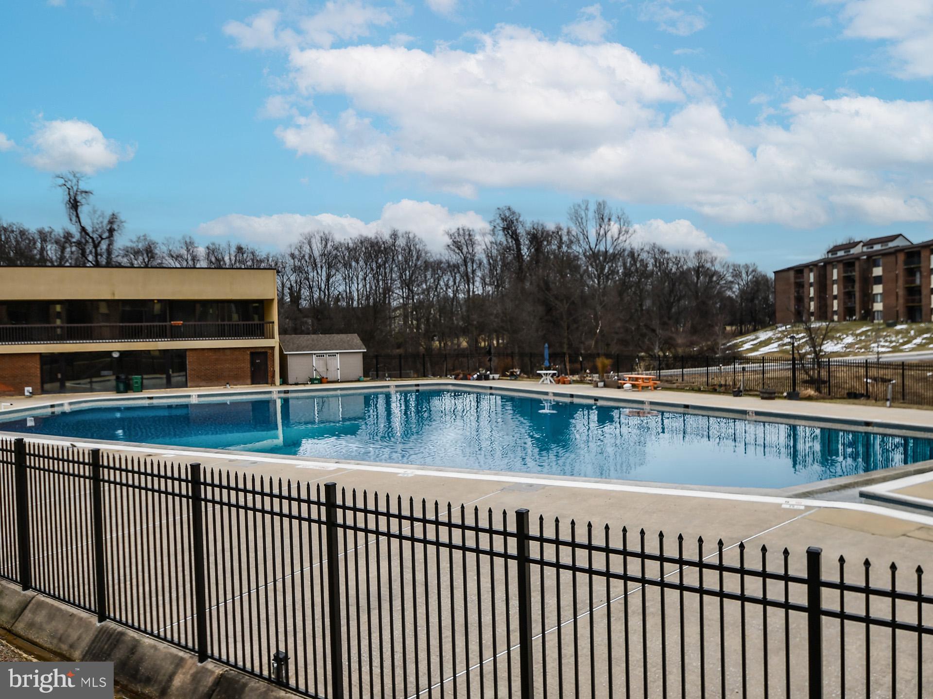 15712 Dorset Road, Unit 104 Laurel, MD 20707 - Photo 49 of 49 a view of swimming pool from a balcony