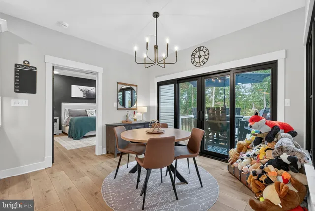 a kitchen with a refrigerator and cabinets