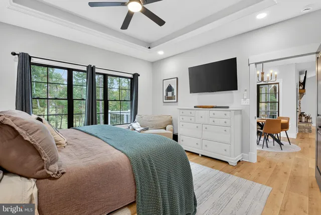 a bedroom with a bed and a chair