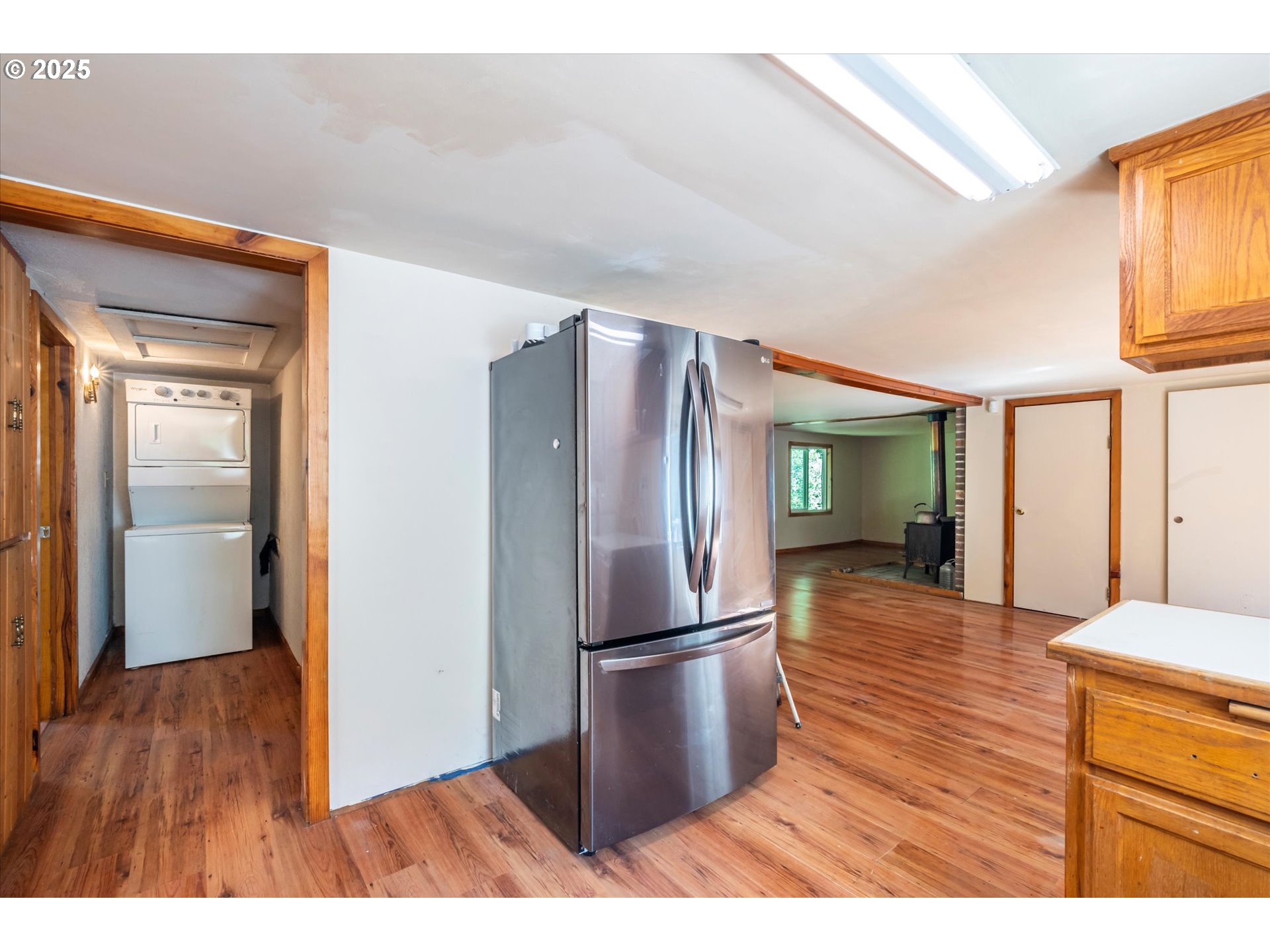 87720 Two Mile Lane Bandon, OR 97411 - Photo 11 of 35 a kitchen with stainless steel appliances granite countertop a refrigerator and a sink