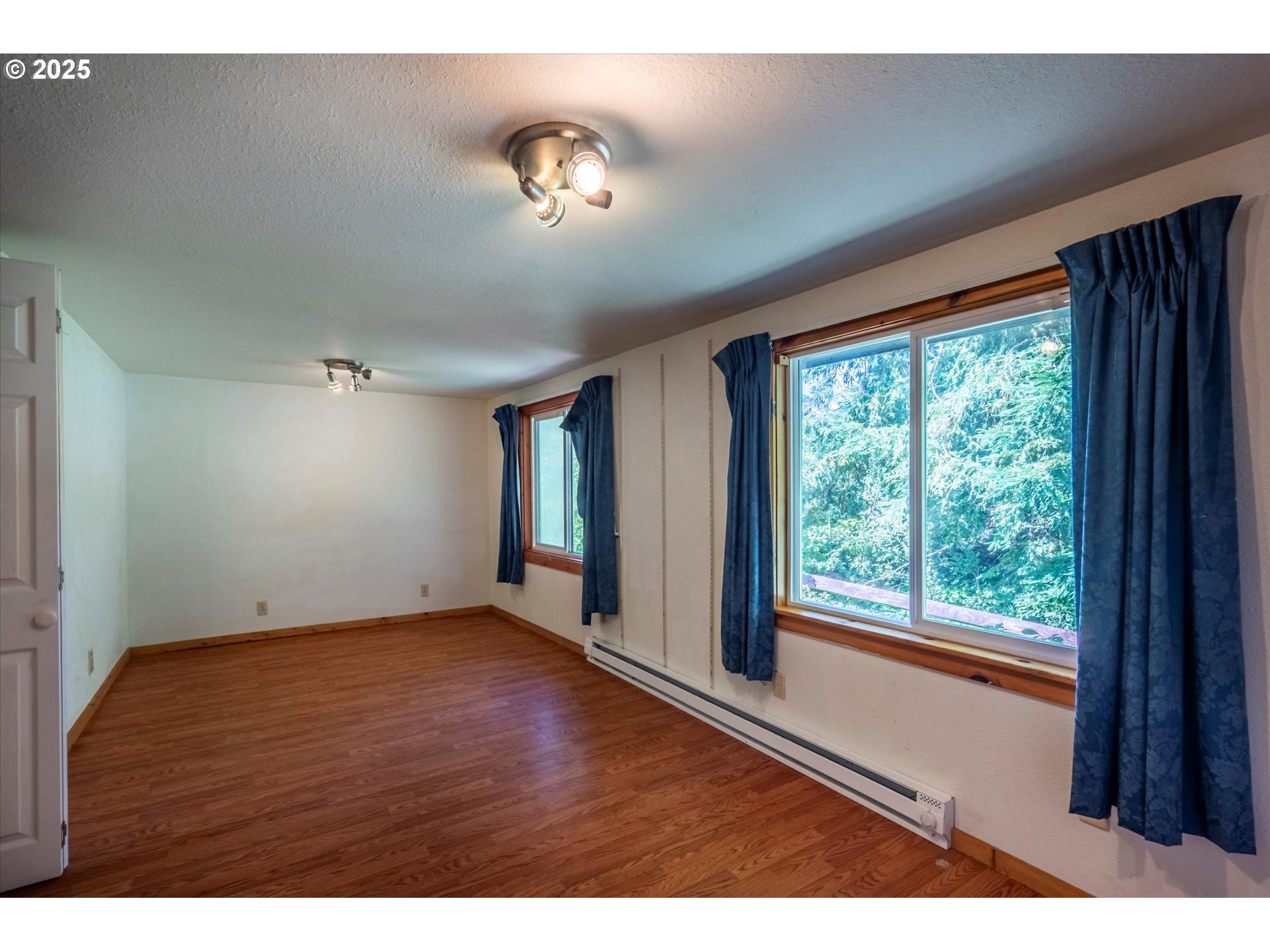 87720 Two Mile Lane Bandon, OR 97411 - Photo 15 of 35 a view of an empty room with a window