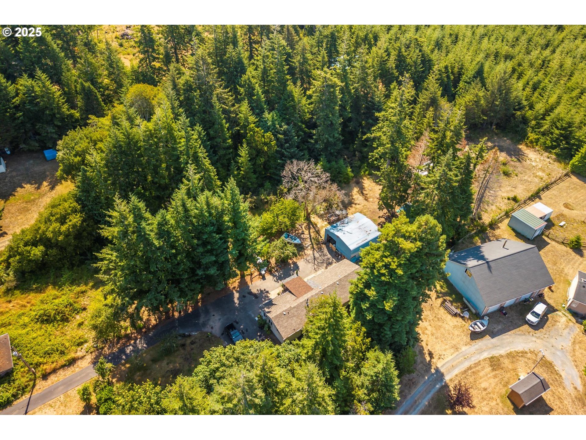 87720 Two Mile Lane Bandon, OR 97411 - Photo 33 of 35 view of a house with a yard