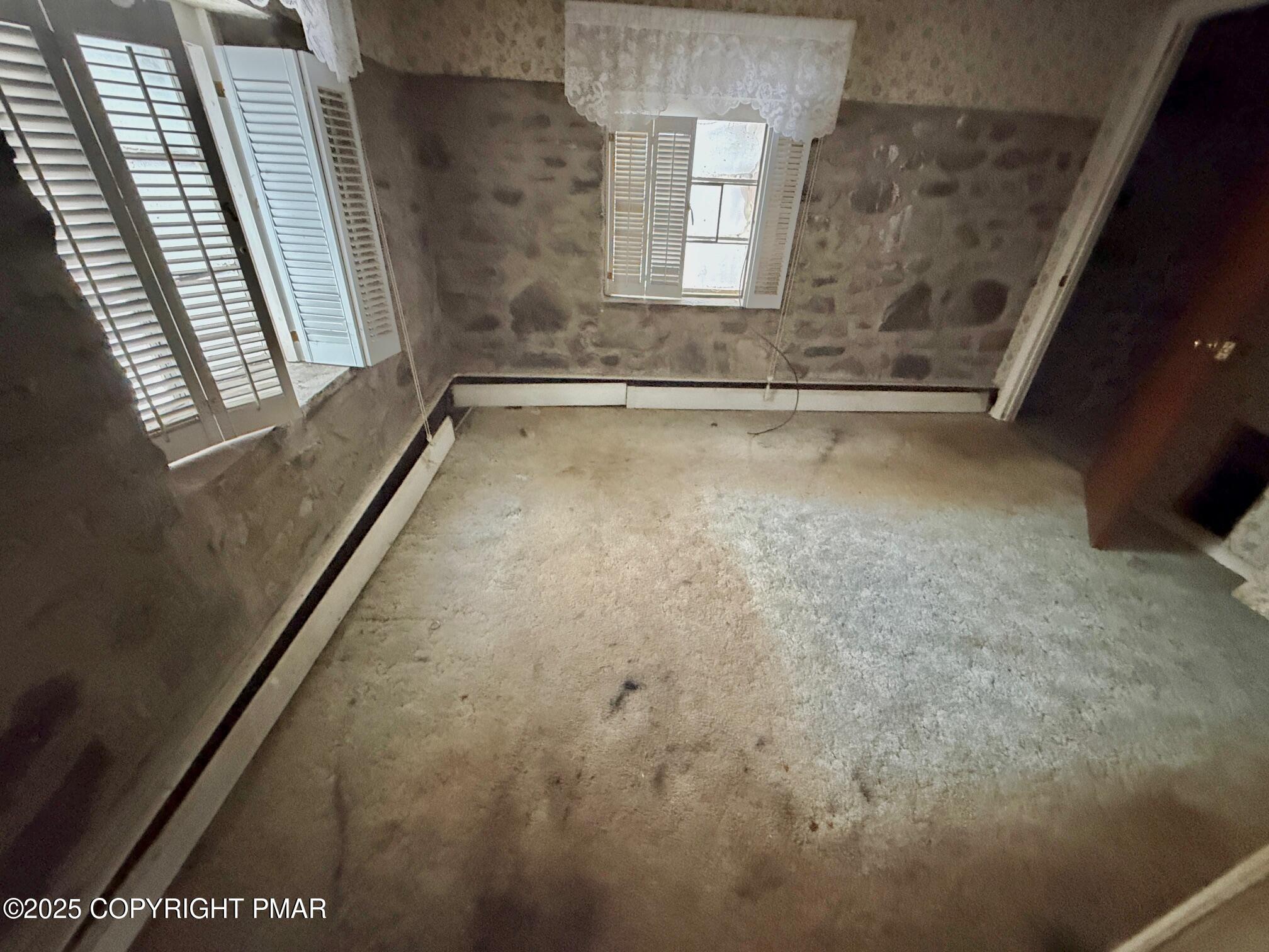 1734 Twin Pine Road Stroudsburg, PA 18360 - Photo 13 of 16 a view of an empty room with a window