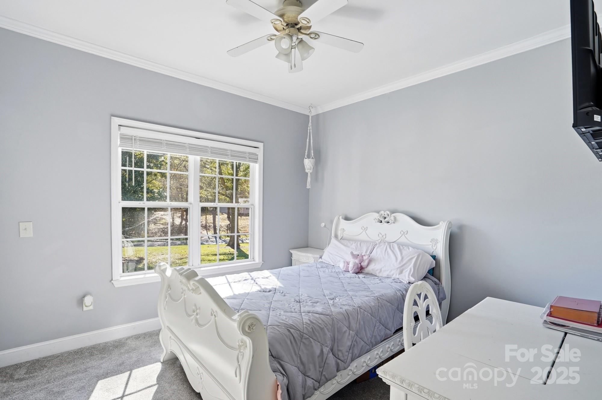 213 Carrie Road Oakboro, NC 28129 - Photo 24 of 40 a bedroom with a bed and a window