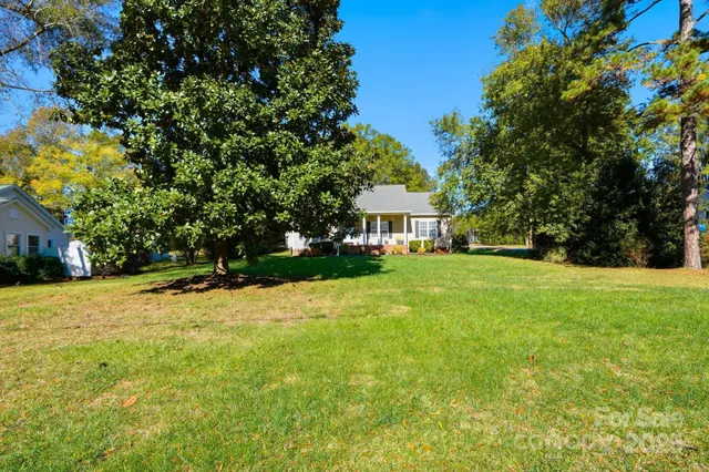 a house view with a garden space