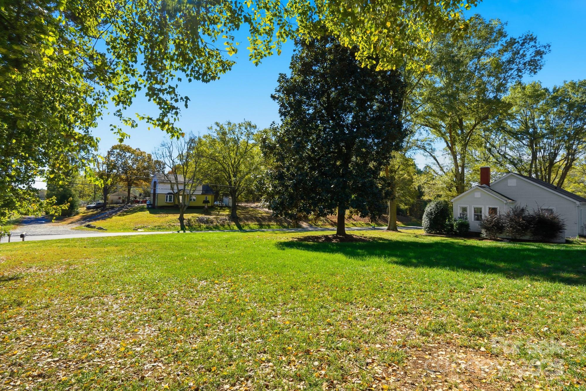 213 Carrie Road Oakboro, NC 28129 - Photo 38 of 40 a view of yard with swimming pool and green space