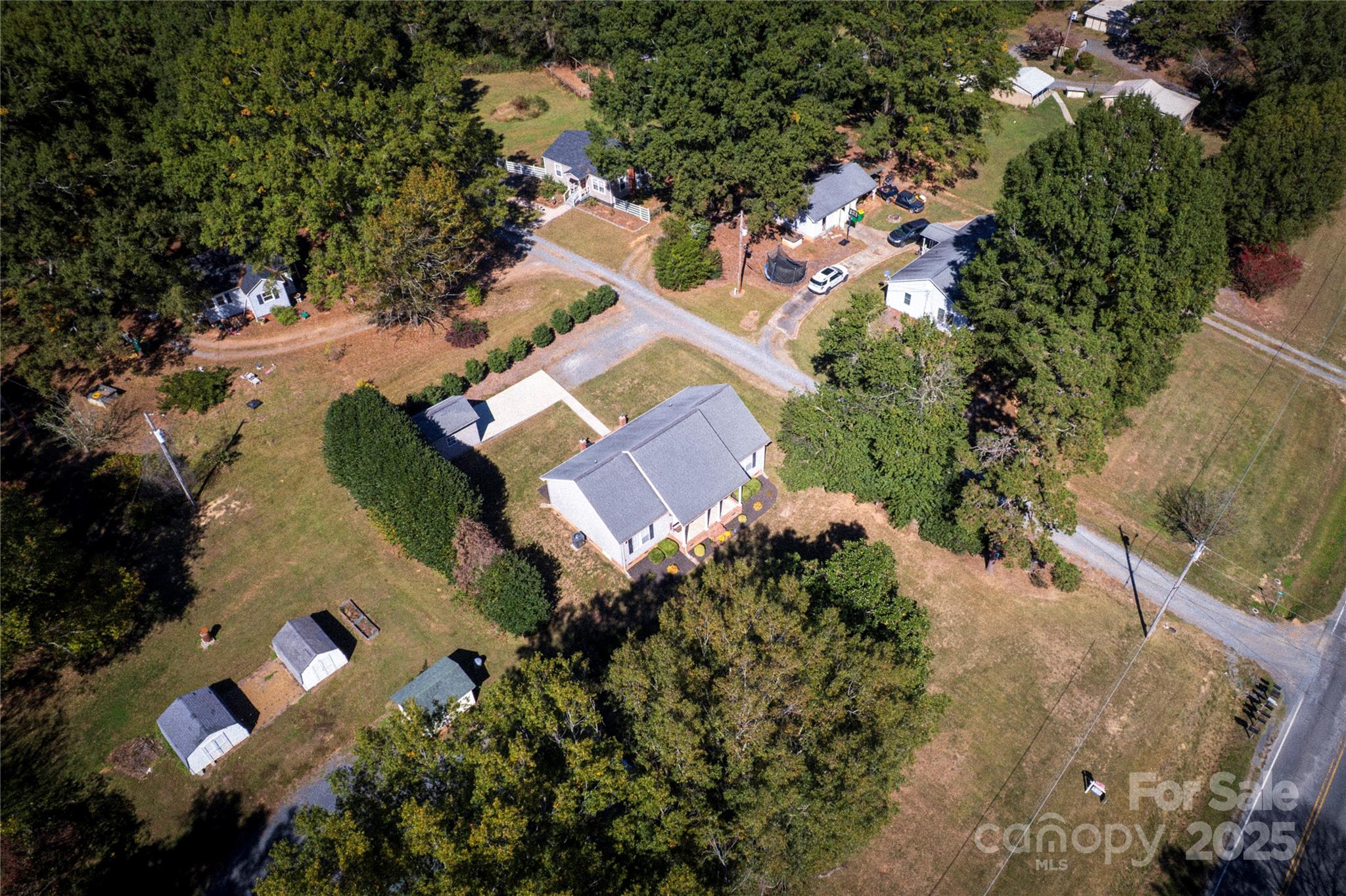 213 Carrie Road Oakboro, NC 28129 - Photo 39 of 40 an aerial view of a house with a yard