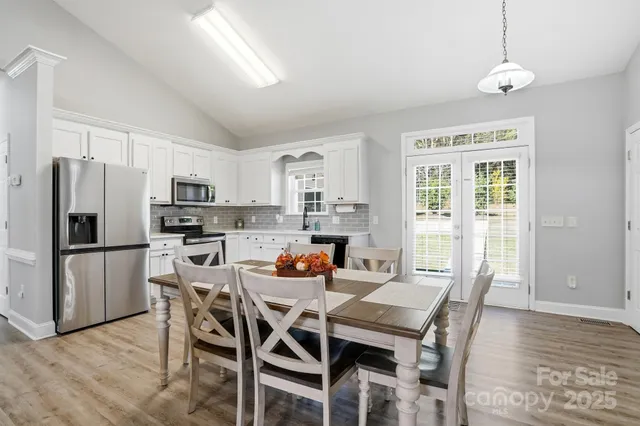 a view of a livingroom and dining room