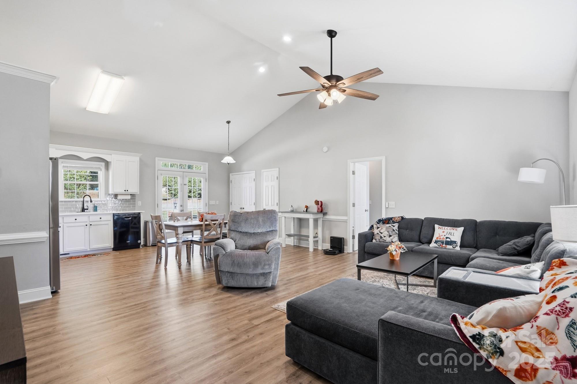 213 Carrie Road Oakboro, NC 28129 - Photo 9 of 40 a living room with furniture and wooden floor