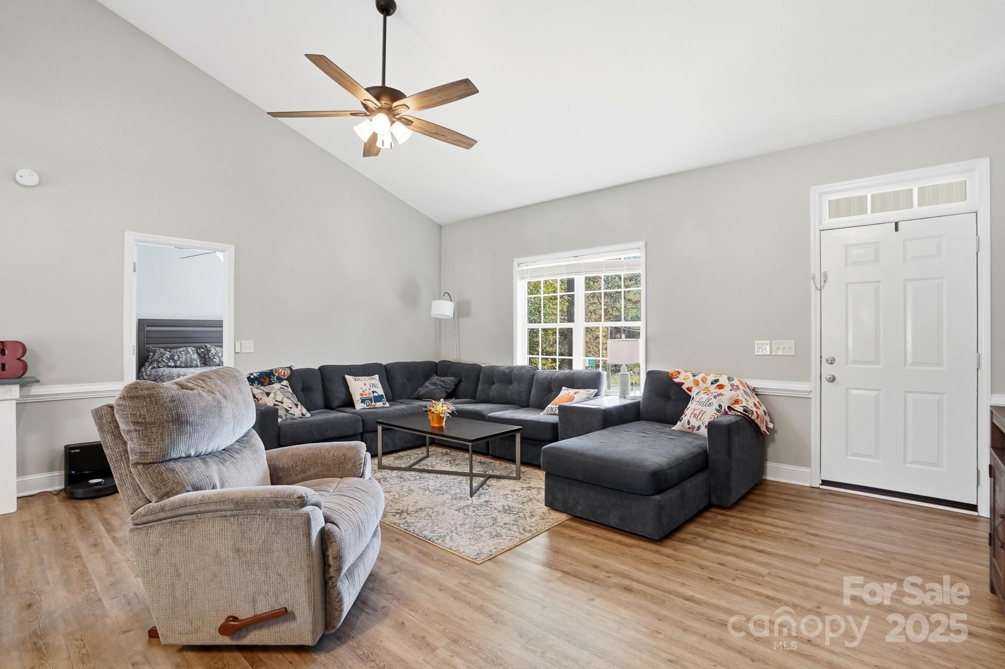 213 Carrie Road Oakboro, NC 28129 - Photo 10 of 40 a living room with furniture and a window