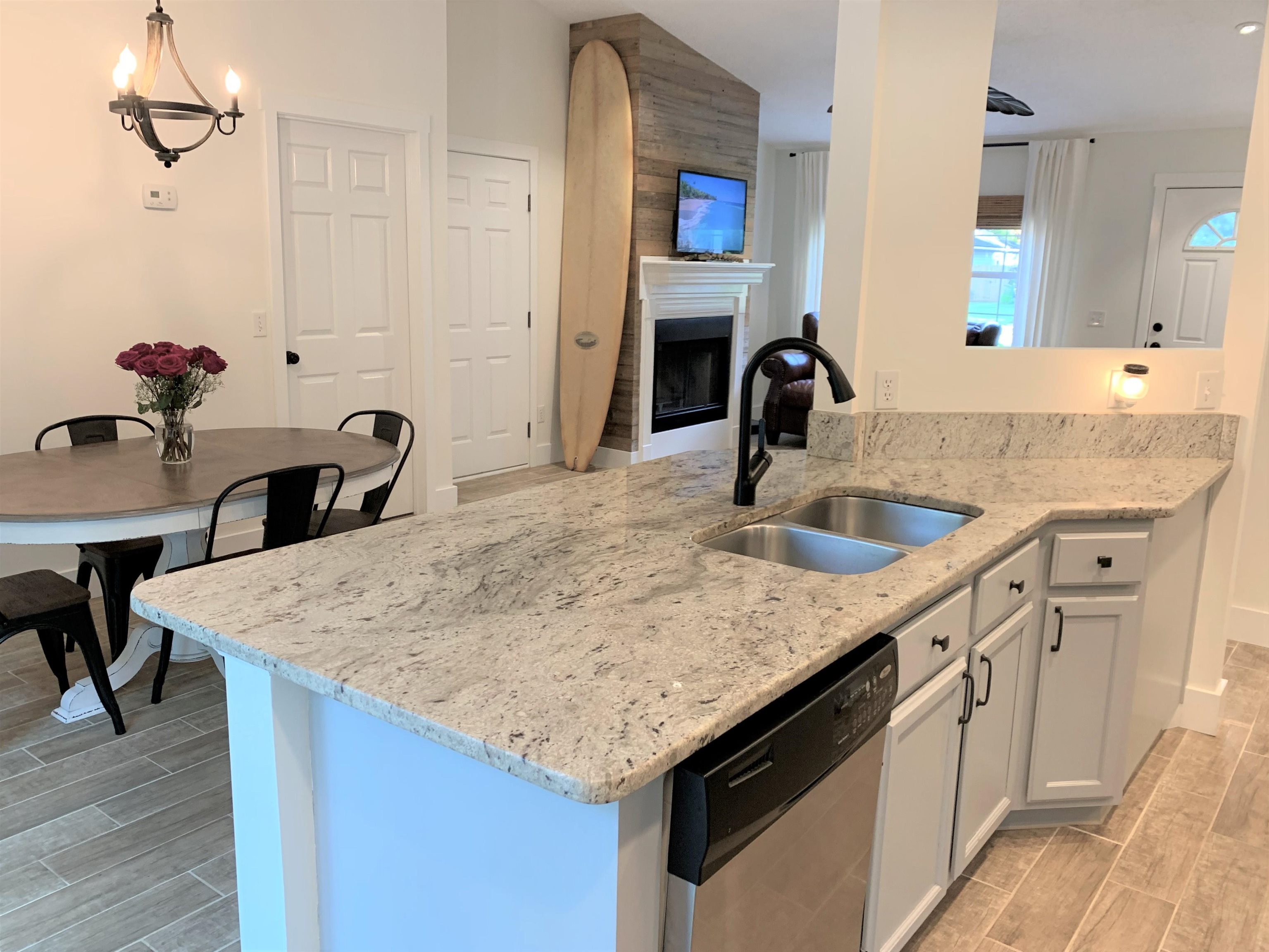 215 Yale Road St. Augustine, FL 32086 - Photo 14 of 35 a kitchen with a sink dishwasher and stove