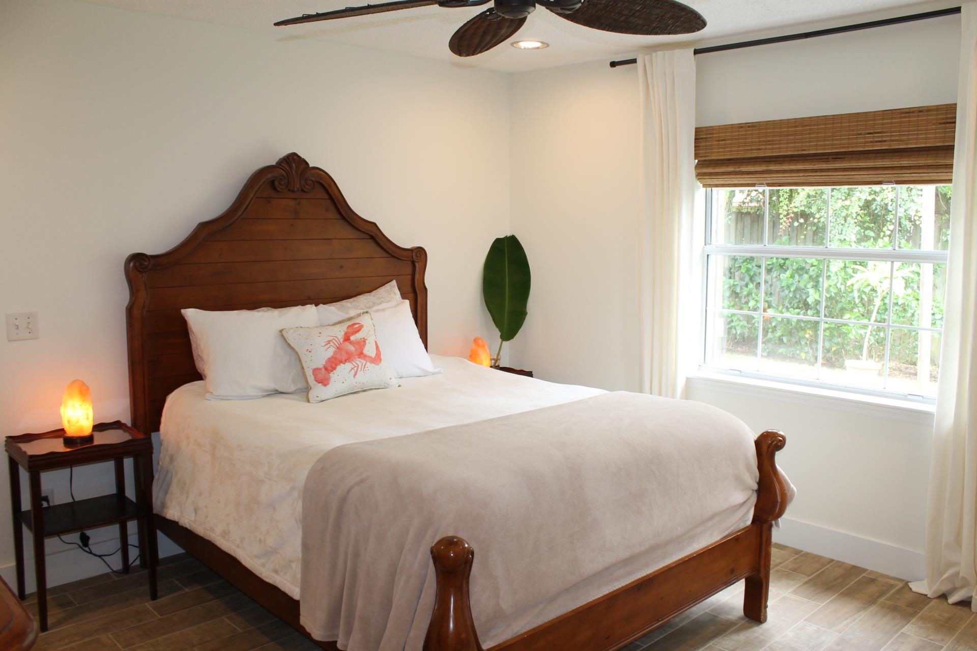215 Yale Road St. Augustine, FL 32086 - Photo 17 of 35 a bedroom with a bed and a window