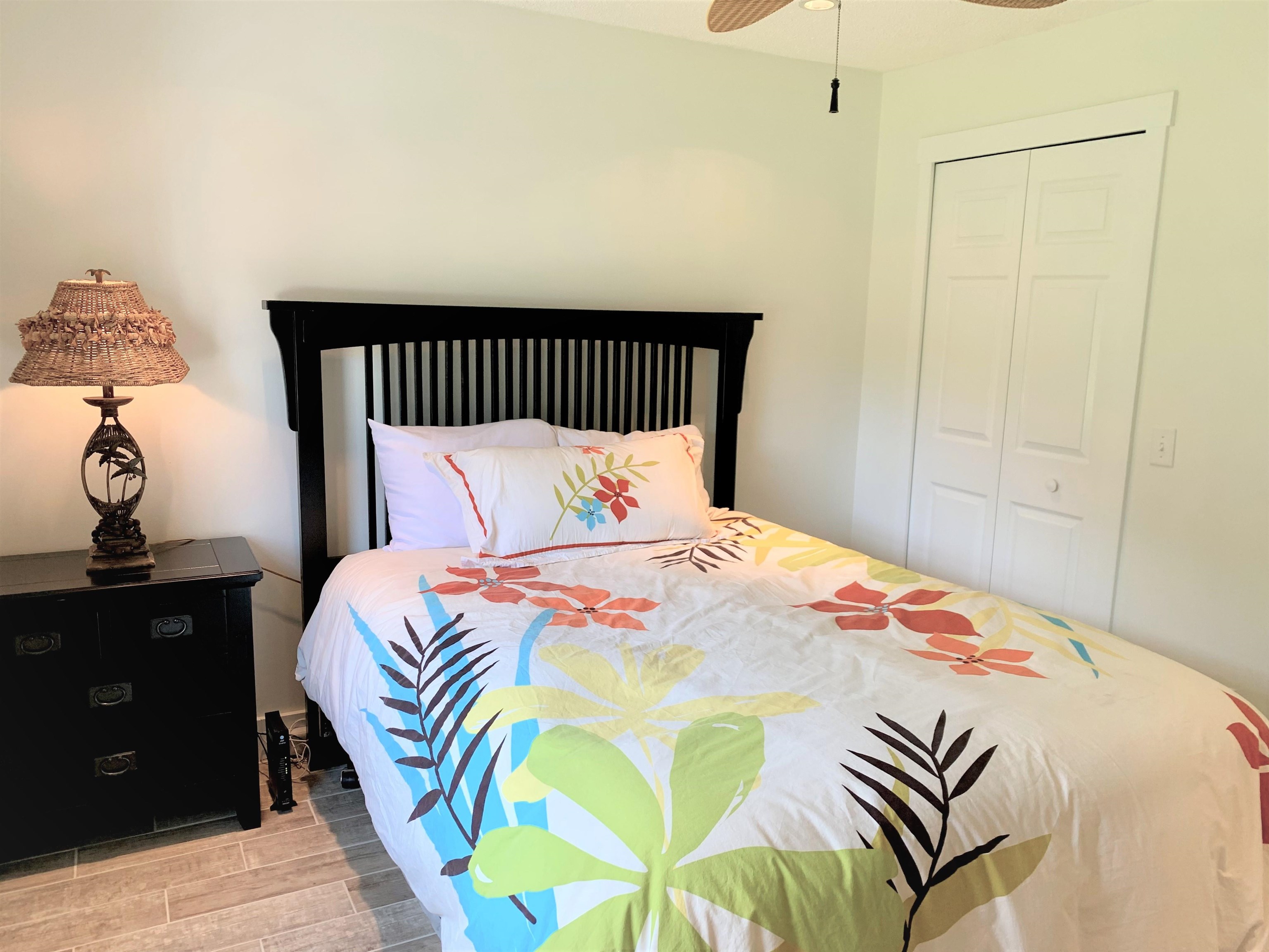 215 Yale Road St. Augustine, FL 32086 - Photo 23 of 35 a bedroom with a bed and wooden floor