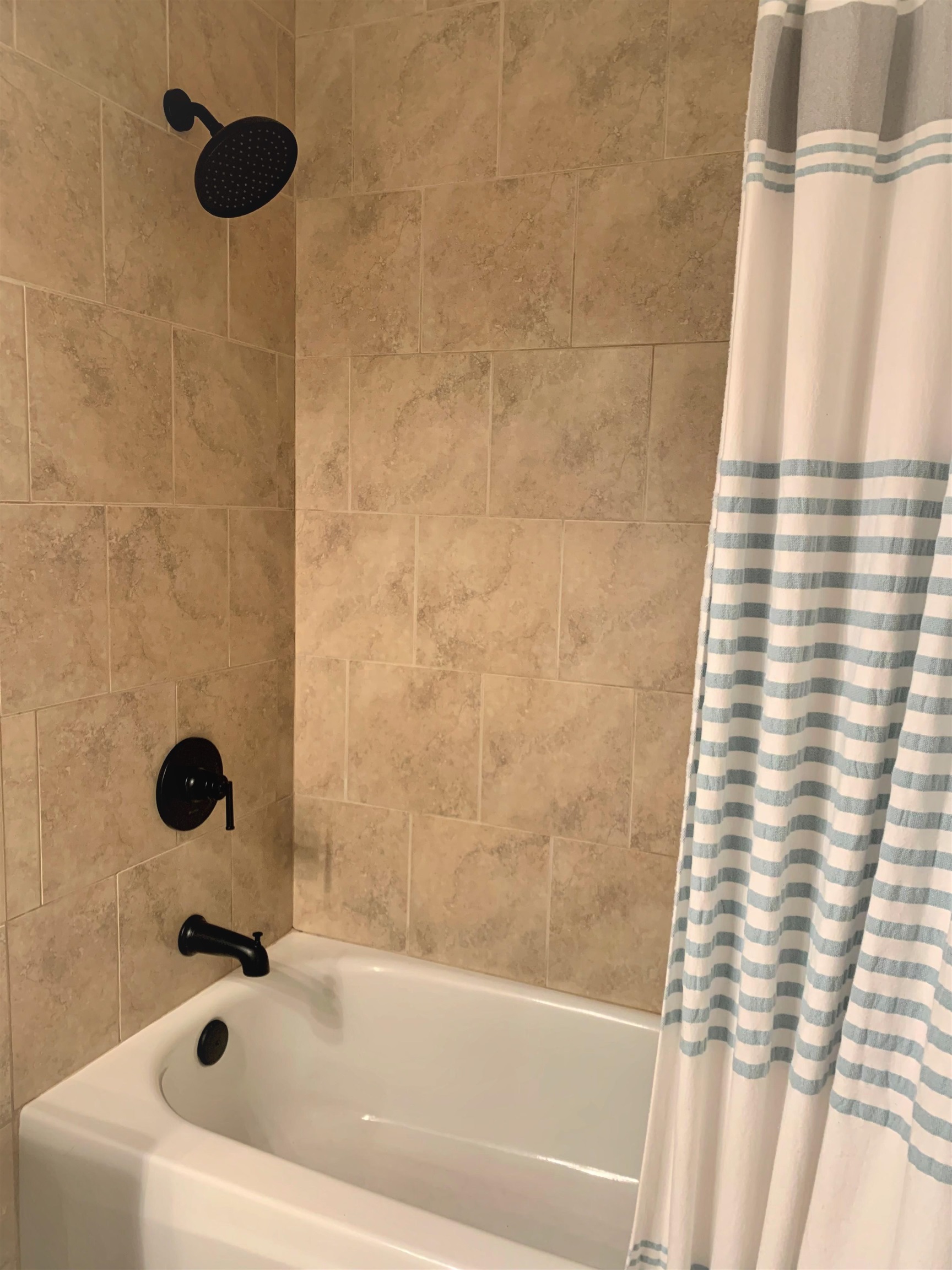 215 Yale Road St. Augustine, FL 32086 - Photo 30 of 35 a bathroom with a bathtub