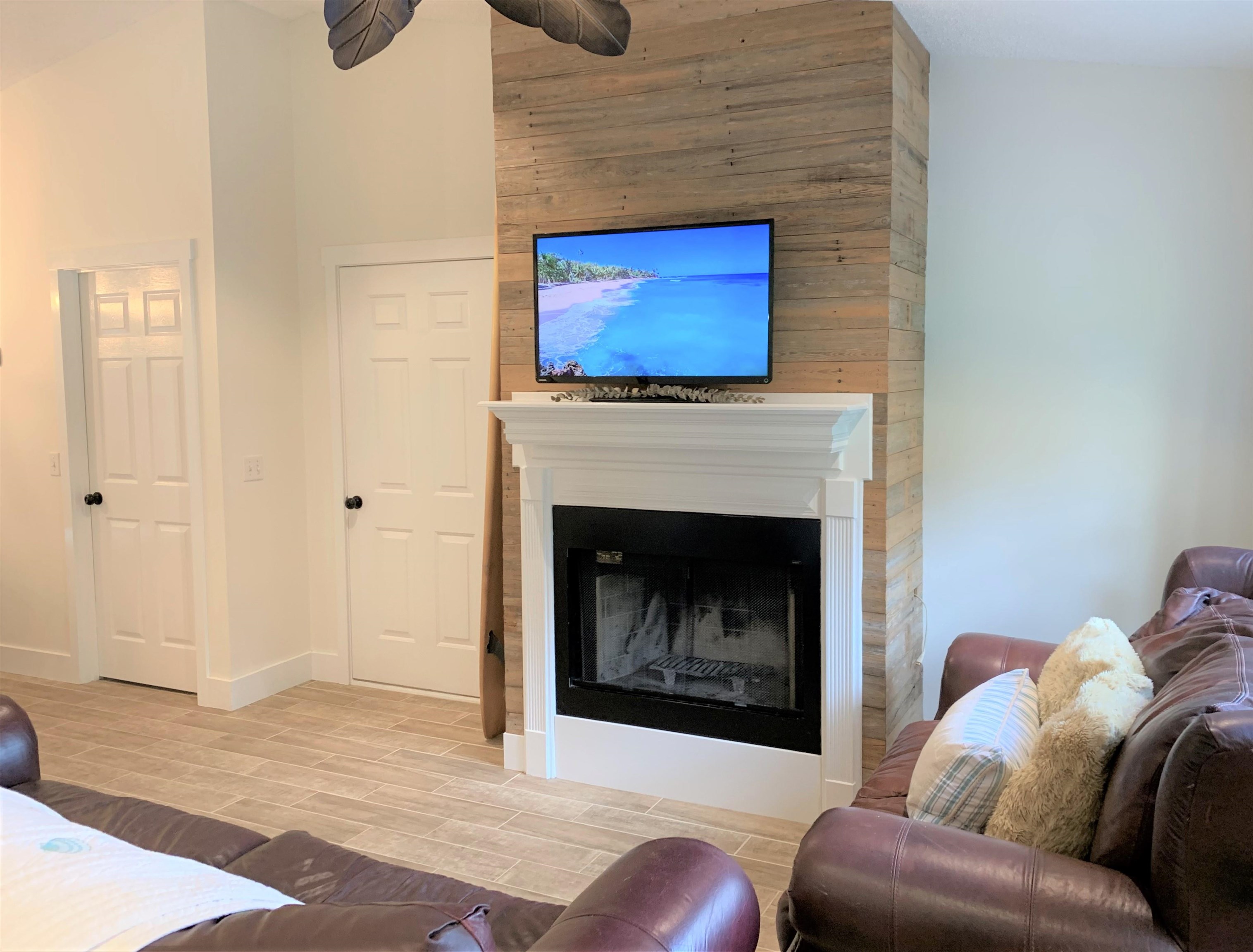 215 Yale Road St. Augustine, FL 32086 - Photo 6 of 35 a living room with furniture and a fireplace