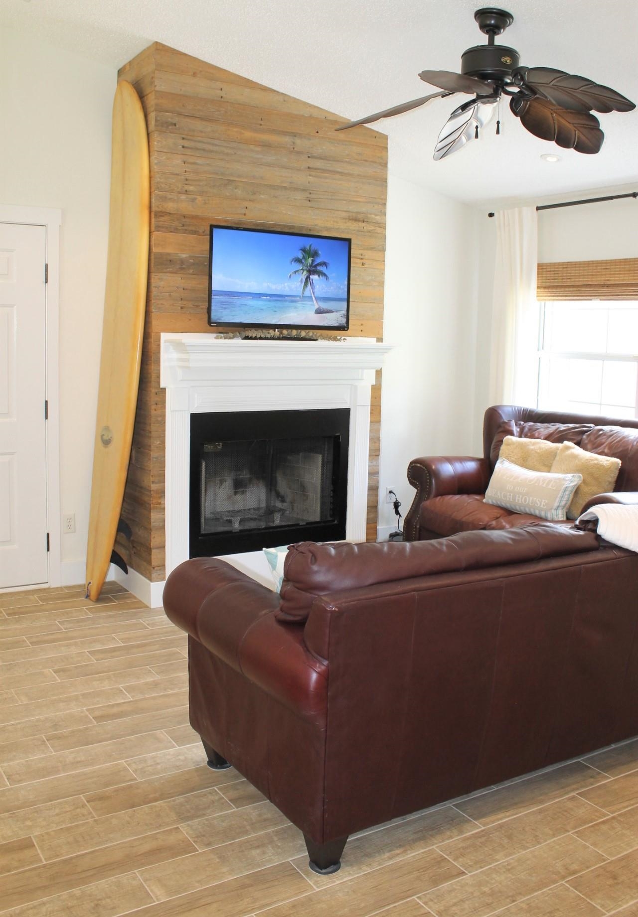 215 Yale Road St. Augustine, FL 32086 - Photo 7 of 35 a living room with furniture and a fireplace